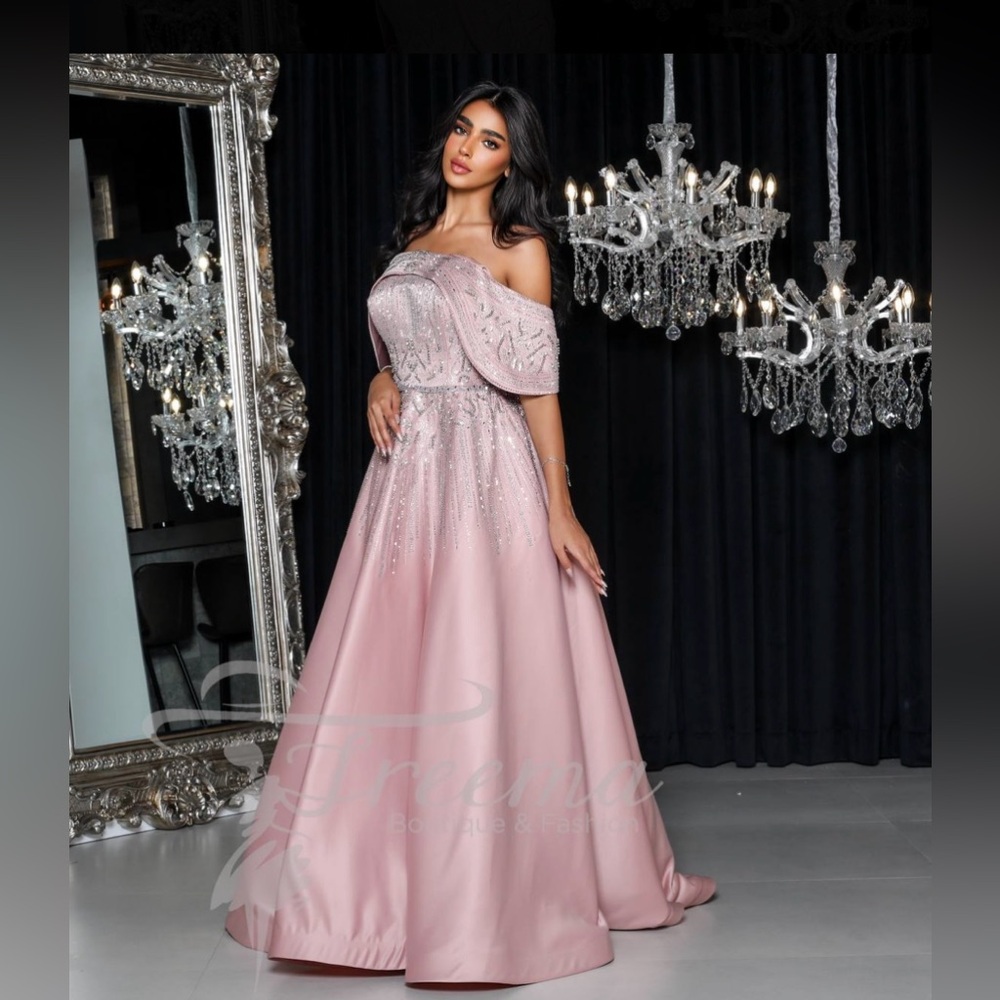 Bridal/ bridesmaid/ prom gown. Strapless. Silver beadings.